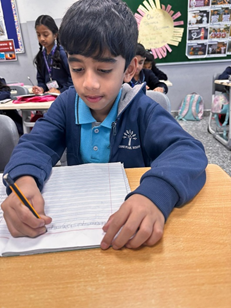 Students Participating in Tamil Handwriting Competition