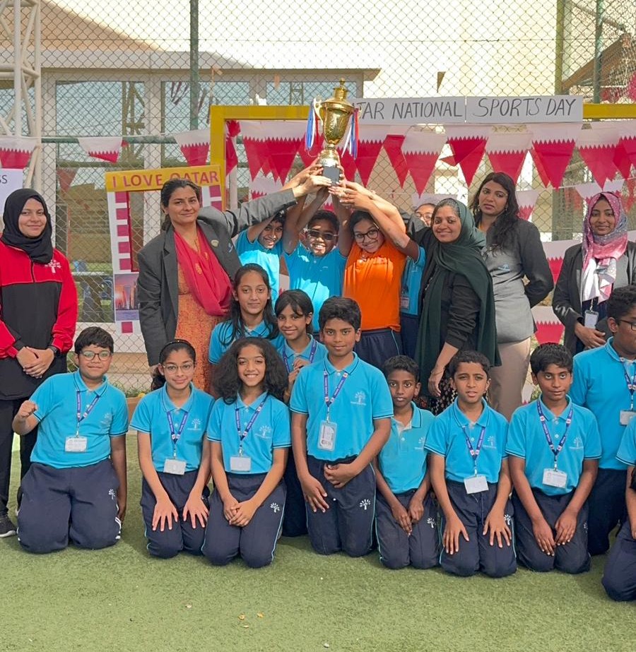 Group photo of Pearl School students and staff celebrating Qatar National Sports Day 2026