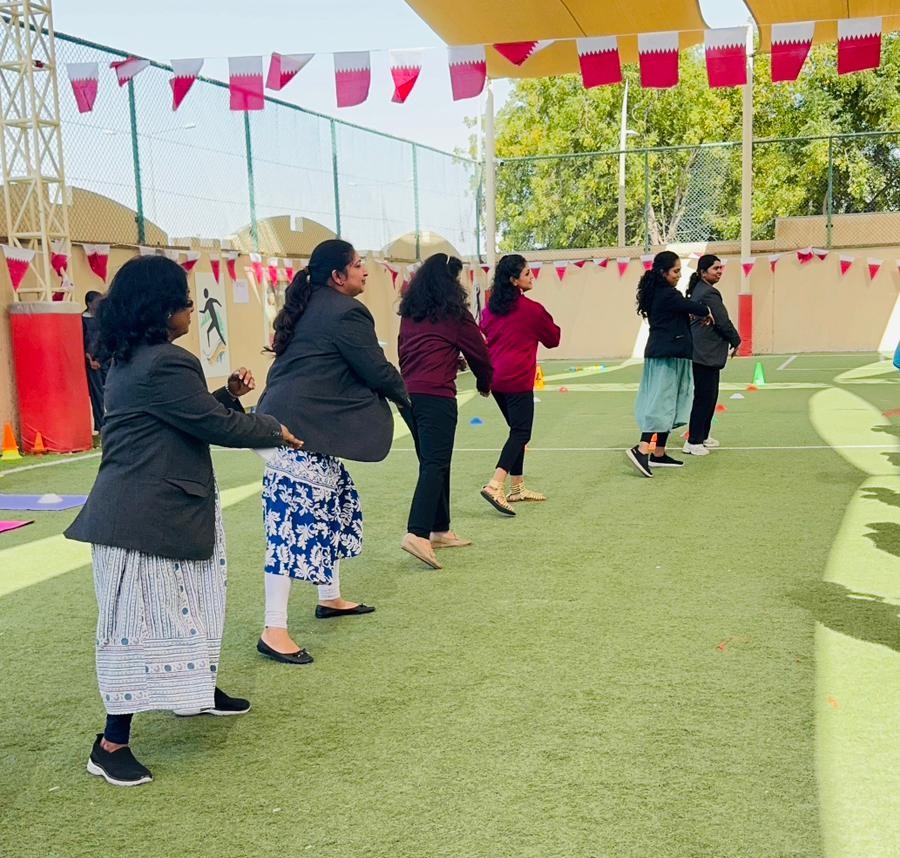 Staff joining health and wellness activities at Pearl School Qatar National Sports Day 2026