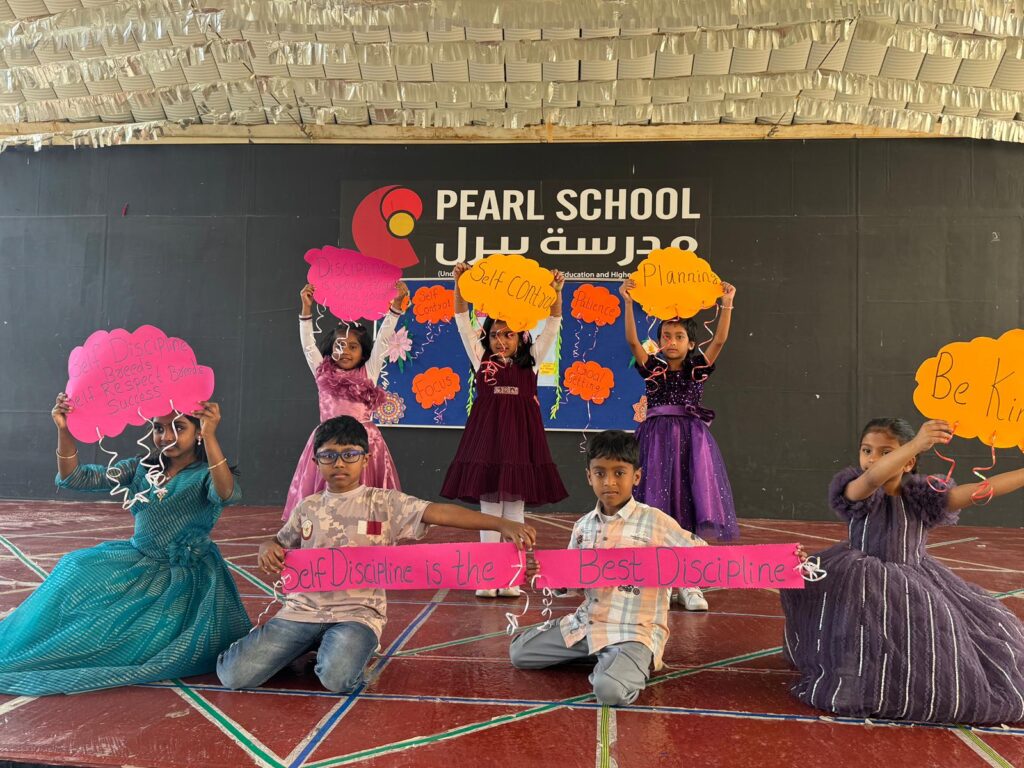Grade 1WB students demonstrating Self-Discipline through role play at Pearl School assembly