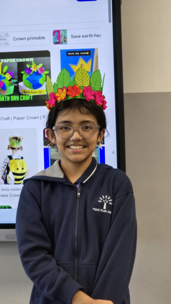 Students creating crowns during Activity on Earth Day Celebration