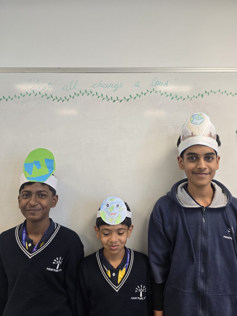 Earth Day school activity students with handmade eco-friendly crowns