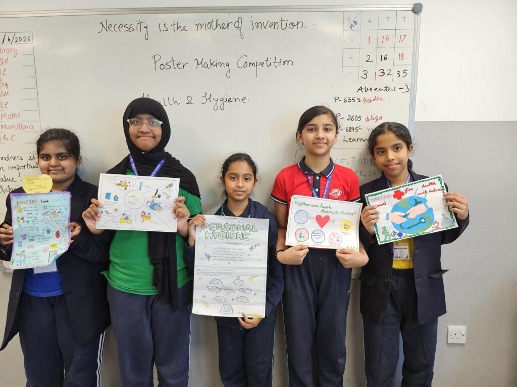Students showcasing posters on cleanliness and fitness for World Health Day competition