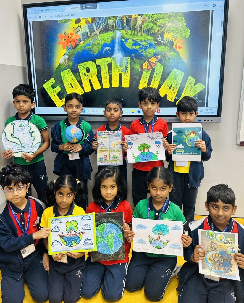 Grade 2 students presenting ideas during Earth Day Activity by grade 1-2