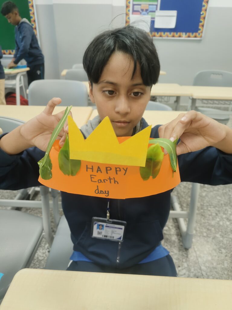 Students creating crowns during Activity on Earth Day Celebration