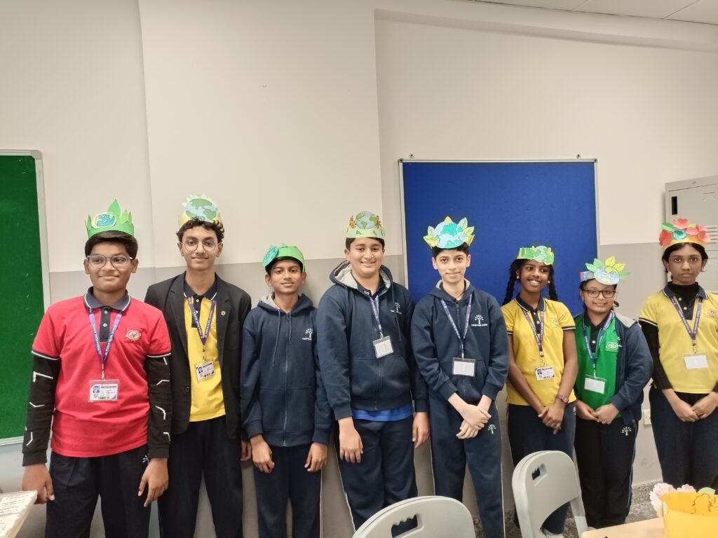 Activity on Earth Day Celebration students making eco-friendly crowns