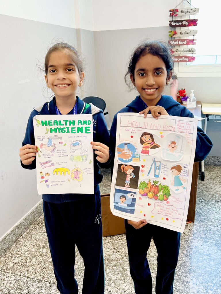 Students showcasing hygiene and healthy living ideas in World Health Day Poster Making Competition