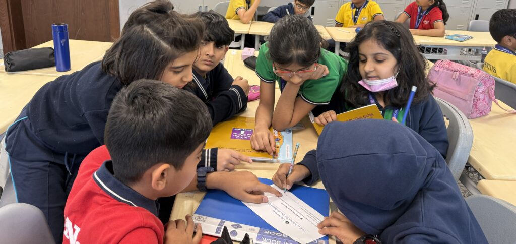 Students engaged in Labour Day activity by Grade 3–5 exploring dignity of labour