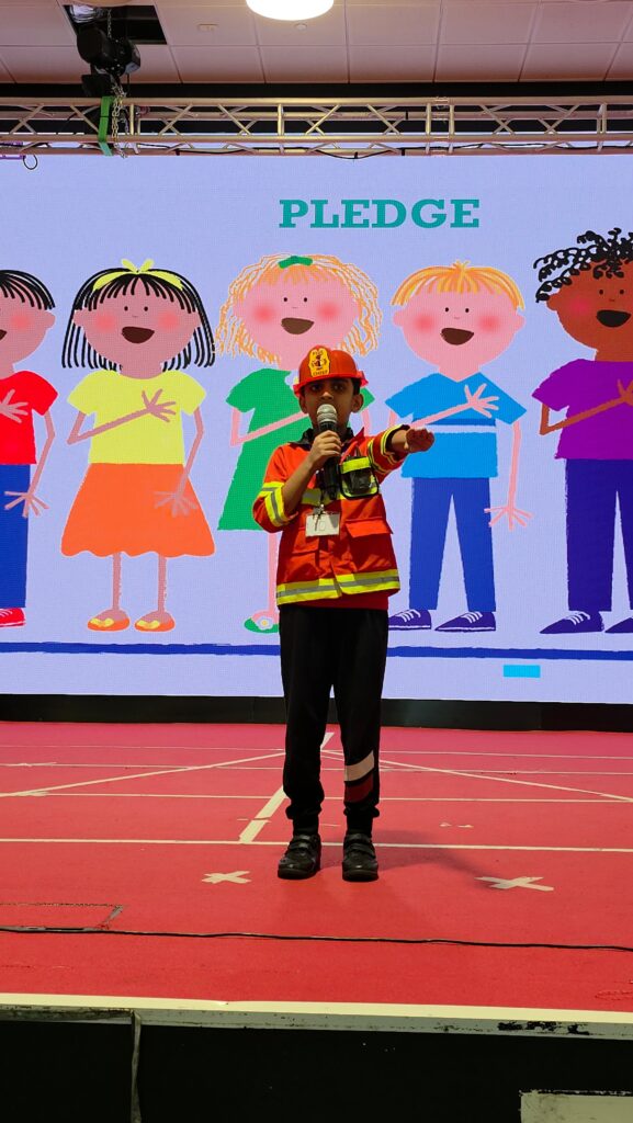 Students taking pledge during Labour Day assembly at school
