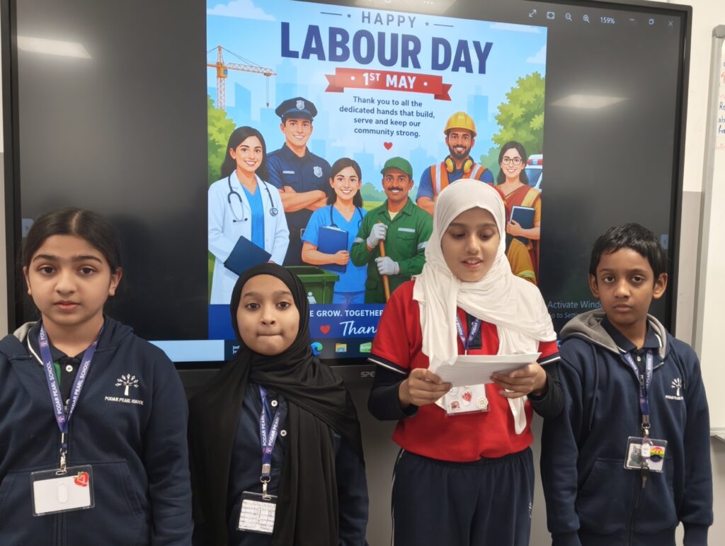 Grade 3 students enjoying colouring sheets in Labour Day activity