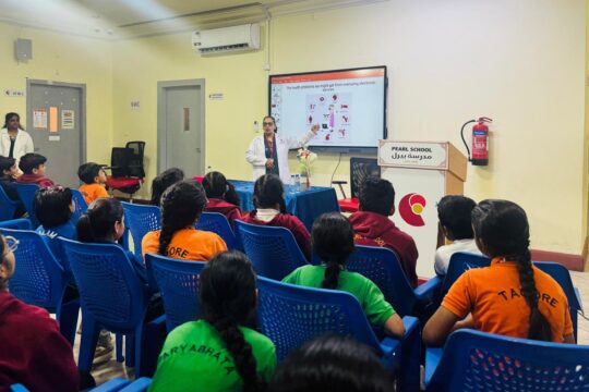 Students attending Workshop on Risk of Electronic Devices session in school